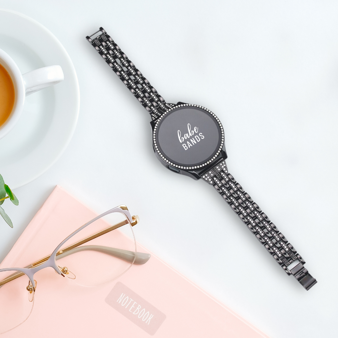 No more basic vibes. Step up your babe game with our premium Babe Bands to elevate your style.   Upgrade your Samsung Galaxy Watch with our Premium Crystal Embellished Classic Style Watch Band + Crystal Case Cover Set.  Indulge in the luxury look and feel of our Samsung Galaxy Watch band, crafted from high-quality stainless steel in.a classic style embellished with crystals for a glamorous touch.