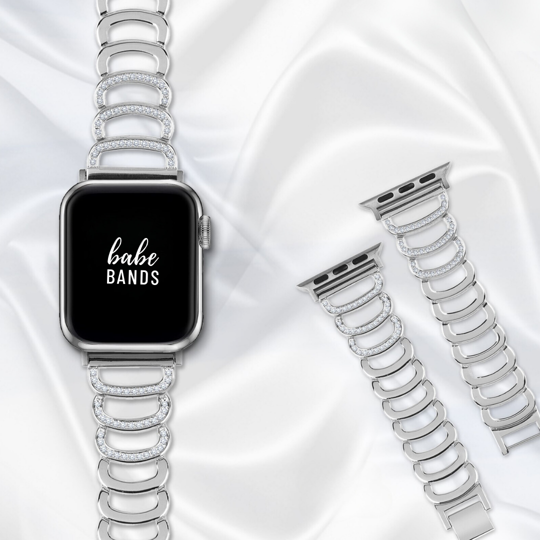 No more basic vibes. Step up your babe game with our premium Babe Bands to elevate your style.     Upgrade your Apple Watch with our Premium Stainless Steel Open Link Crystal Apple Watch Band.  Indulge in the luxury look and feel of our Apple Watch band, crafted from high-quality stainless steel open link band with faux diamond detailing for added style.