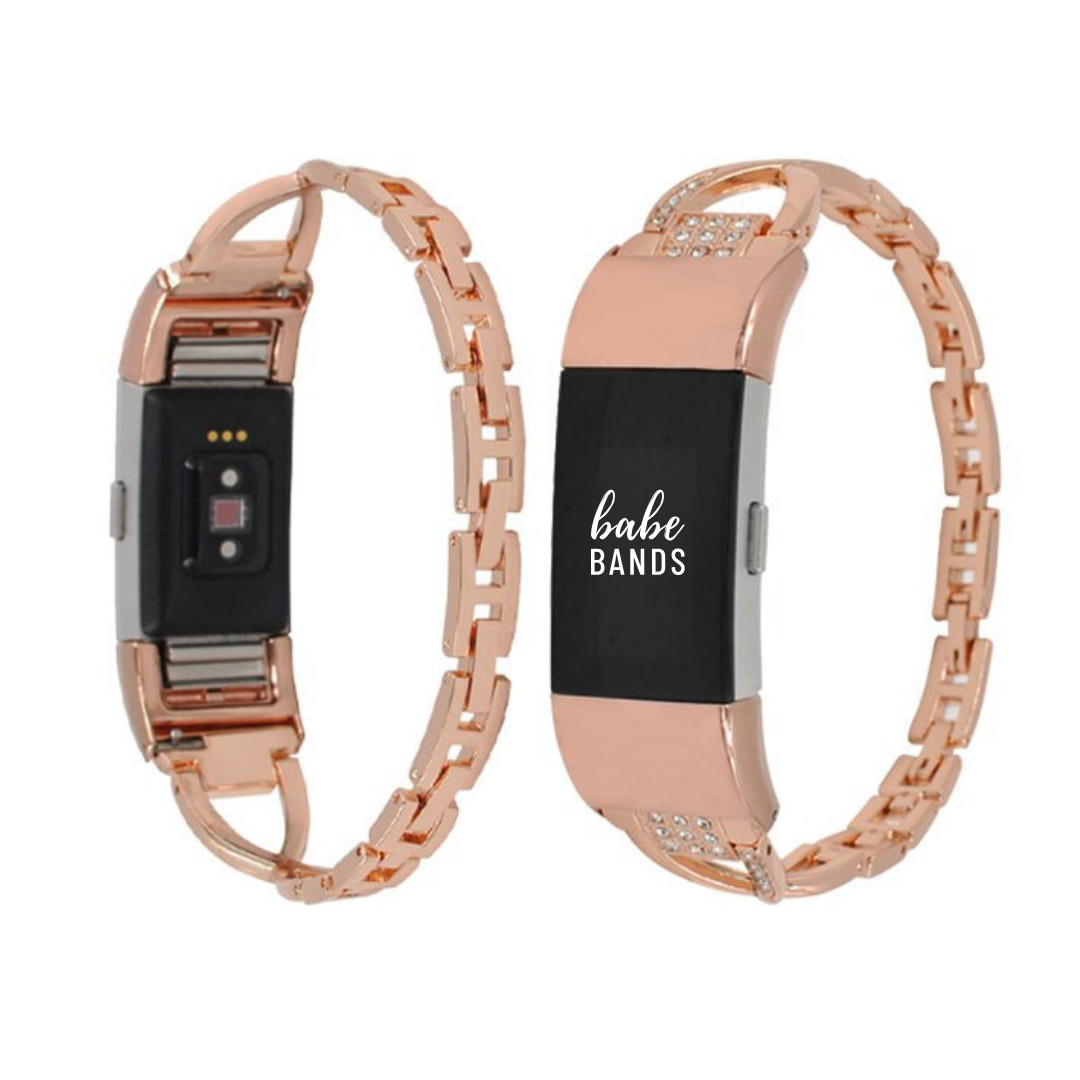 No more basic vibes. Step up your babe game with our premium Babe Bands to elevate your style.     Upgrade your Fitbit Charge with our Premium Stainless Steel Crystal X Fitbit Charge Band.  Indulge in the luxury look and feel of our Apple Watch band, crafted from high-quality stainless steel in an elegant x-shape with faux diamond detailing for added style.