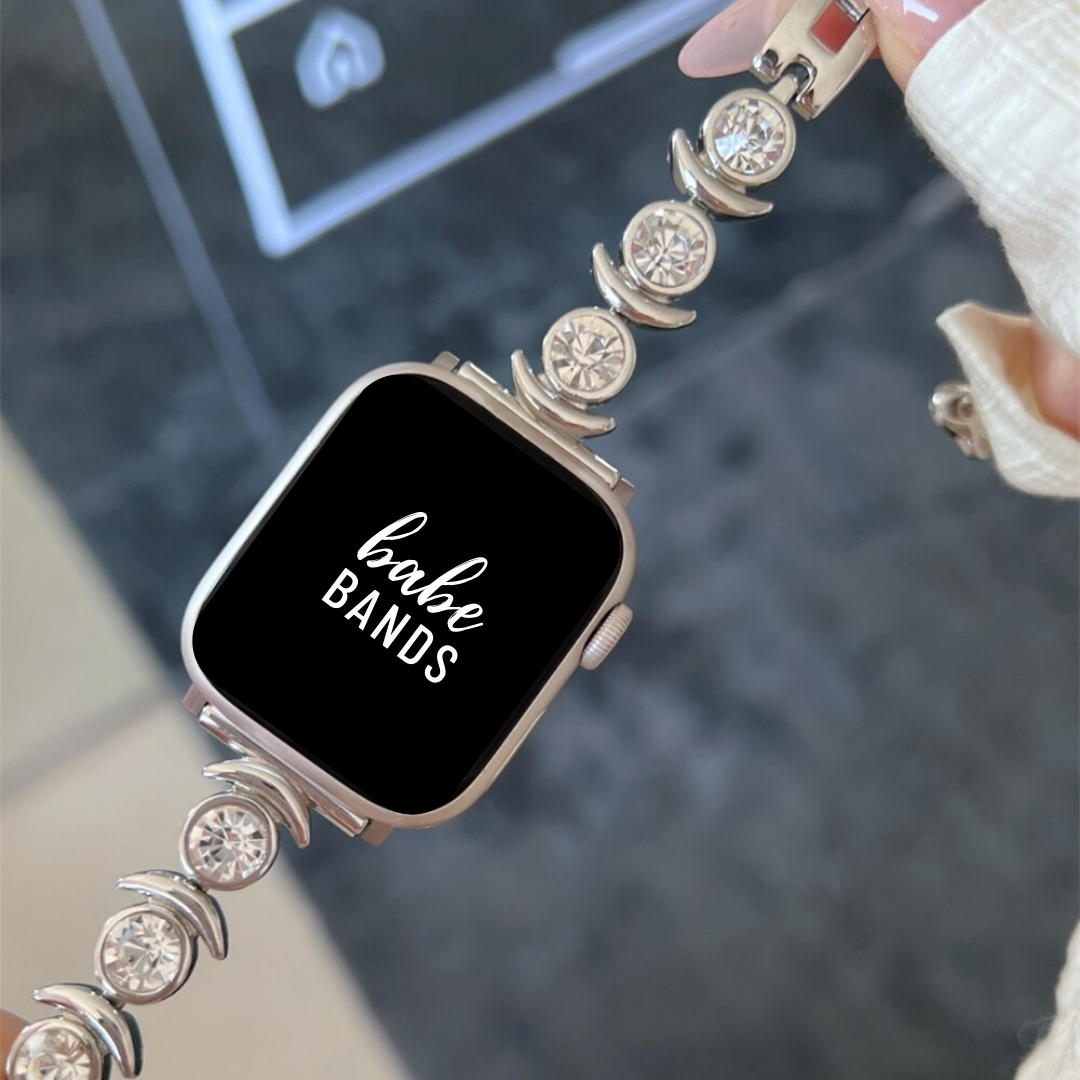 No more basic vibes. Step up your babe game with our premium Babe Bands to elevate your style.   Upgrade your Apple Watch with our Premium Stainless Steel Crescent Moon Chunky Diamond Apple Watch Band.  Indulge in the luxury look and feel of our Apple Watch band, crafted from high-quality stainless steel in an elegant design with chunky faux diamonds accented by delicate crescent moon detailing.