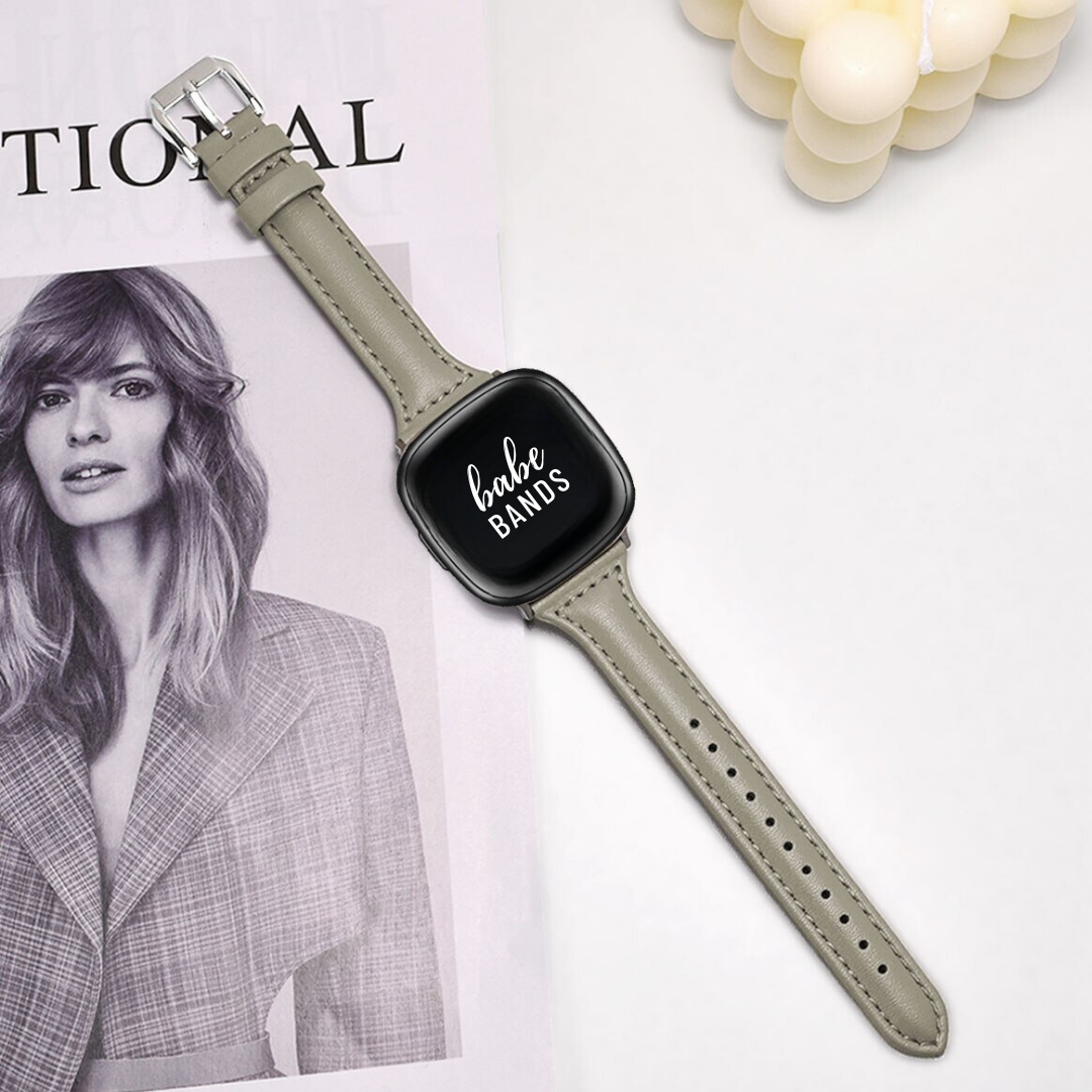 No more basic vibes. Step up your babe game with our premium Babe Bands to elevate your style.    Upgrade your Fitbit Versa or Fitbit Sense with our Premium Genuine Leather Slim Fitbit Versa/Sense Watch Band.  Indulge in the luxury look and feel of our Fitbit band, crafted from high-quality genuine leather with a stainless steel classic buckle closure.