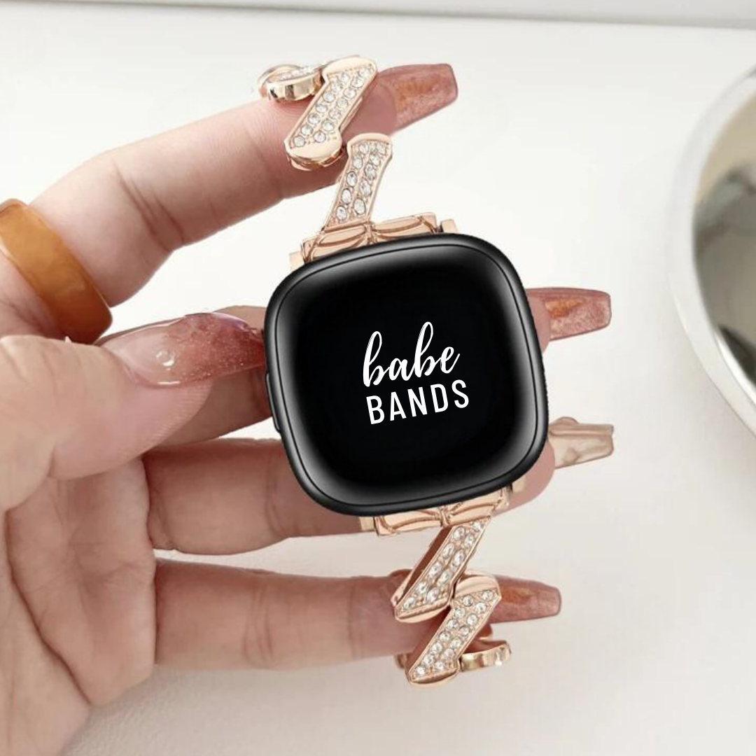 No more basic vibes. Step up your babe game with our premium Babe Bands to elevate your style.   Upgrade your Fitbit Versa or Fitbit Sense with our Premium Stainless Steel Diamond Zig Zag Fitbit Versa/Sense Band.  Indulge in the luxury look and feel of our Fitbit band, crafted from high-quality stainless steel band in a unique zig zag shape embellished with sparkling rhinestones for added style.