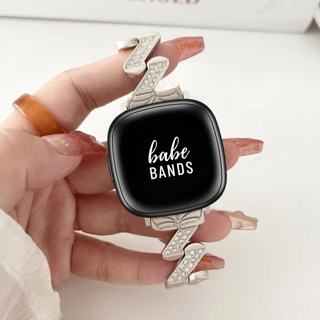 No more basic vibes. Step up your babe game with our premium Babe Bands to elevate your style.   Upgrade your Fitbit Versa or Fitbit Sense with our Premium Stainless Steel Diamond Zig Zag Fitbit Versa/Sense Band.  Indulge in the luxury look and feel of our Fitbit band, crafted from high-quality stainless steel band in a unique zig zag shape embellished with sparkling rhinestones for added style.