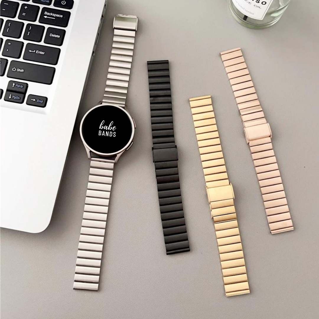 No more basic vibes. Step up your babe game with our premium Babe Bands to elevate your style.    Upgrade your Samsung Galaxy Watch with our Premium Stainless Steel Ribbed Samsung Galaxy Watch Band.  Indulge in the luxury look and feel of our Samsung Galaxy Watch band, crafted from high-quality stainless steel in gorgeous ribbed look for added style.