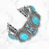 No more basic vibes. Step up your babe game with our premium Babe Bands to elevate your style.   Upgrade your Apple Watch with our Premium Stainless Steel Antiqued Western Turquoise Apple Watch Band.  Indulge in the luxury look and feel of our Apple Watch band, crafted from high-quality stainless steel in an elaborate antiqued finish western styled strap embellished with faux turquoise stones.