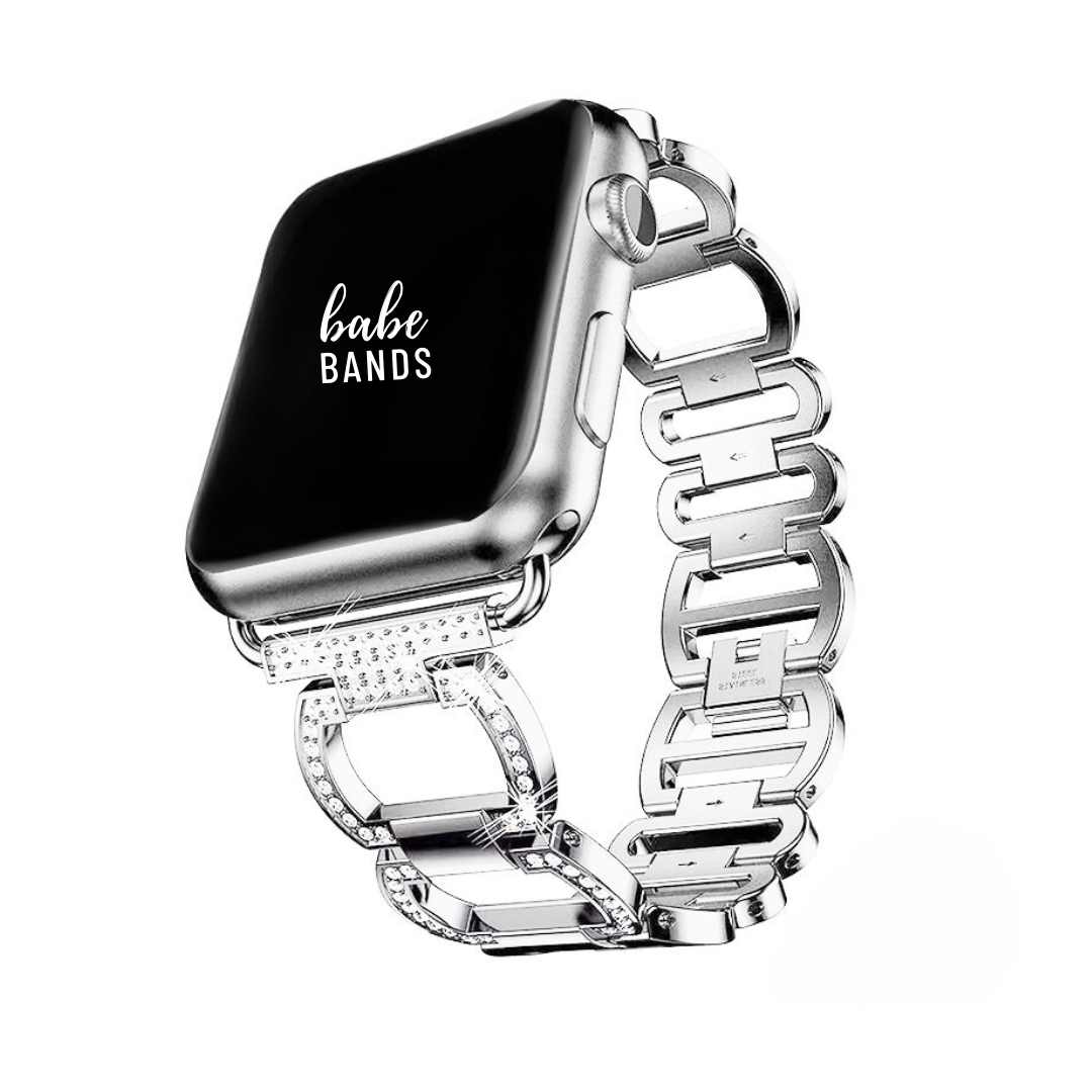 No more basic vibes. Step up your babe game with our premium Babe Bands to elevate your style.   Upgrade your Apple Watch with our Premium Crystal Embellished Oval Link Apple Watch Band.  Indulge in the luxury look and feel of our Apple Watch band, crafted from high-quality stainless steel in a stylish rounded rectangle link embellished with faux diamonds.