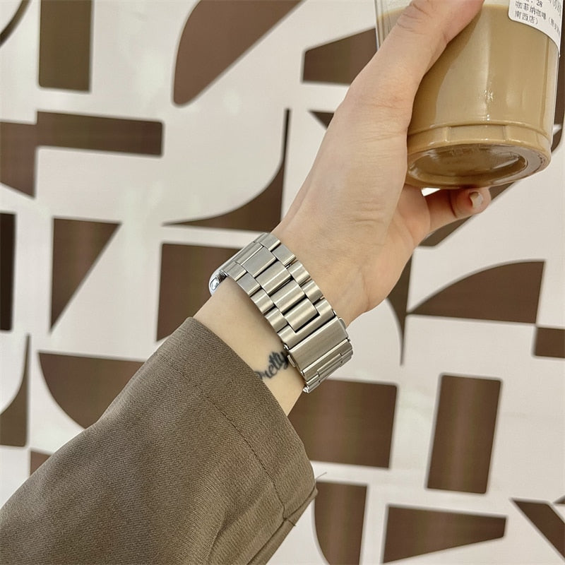 No more basic vibes. Step up your babe game with our premium Babe Bands to elevate your style.     Upgrade your Apple Watch with our Premium Stainless Steel Classic Style Apple Watch Band.  Indulge in the luxury look and feel of our Apple Watch band, crafted from high-quality stainless steel in a classic link band style. 