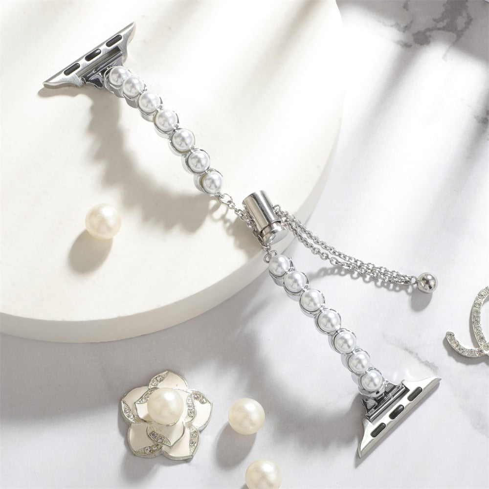 No more basic vibes. Step up your babe game with our premium Babe Bands to elevate your style.    Upgrade your Apple Watch with our Premium Stainless Steel Pearl Bracelet Apple Watch Band.  Indulge in the luxury look and feel of our Apple Watch band, crafted from high-quality stainless steel in an elegant adjustable bracelet style with pearl detailing.